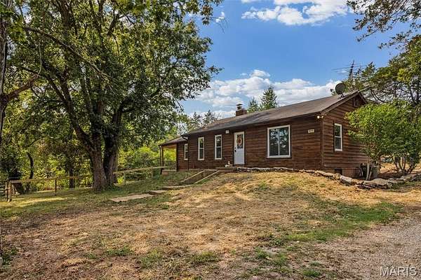 6.89 Acres of Land with Home for Sale in Cedar Hill, Missouri