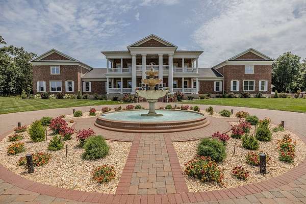 7 Acres of Land with Home for Auction in Lebanon, Missouri