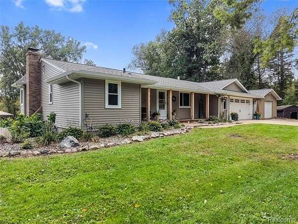 12.1 Acres of Land with Home for Sale in Woodhull Township, Michigan