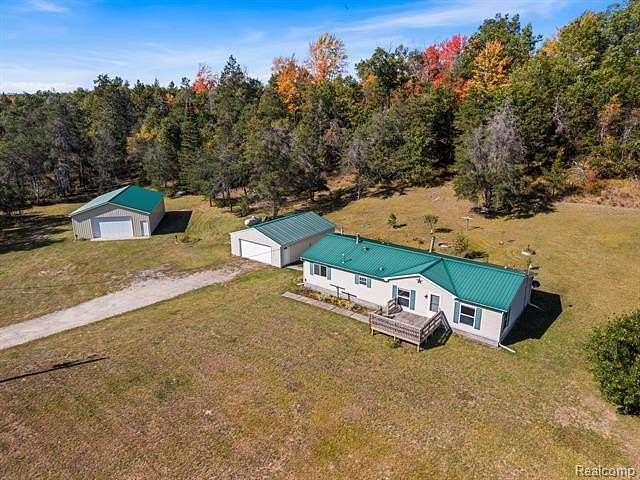 5 Acres of Land with Home for Sale in Greenwood Township, Michigan