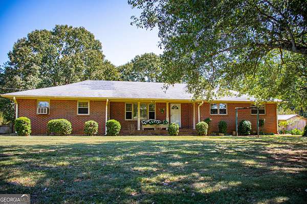 5.52 Acres of Land with Home for Sale in Bowdon, Georgia