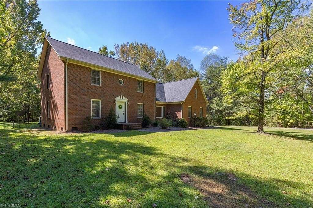 8.73 Acres of Land with Home for Sale in Oak Ridge, North Carolina