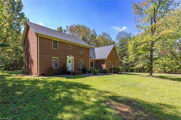 8.73 Acres of Land with Home for Sale in Oak Ridge, North Carolina