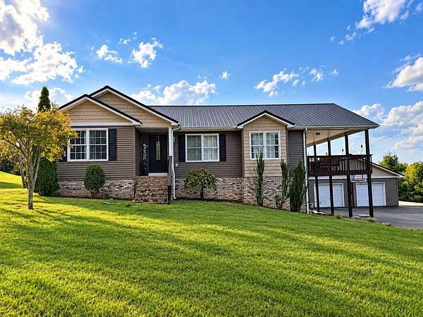 9.82 Acres of Land with Home for Sale in Tompkinsville, Kentucky