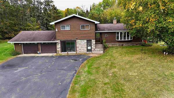13.7 Acres of Recreational Land with Home for Sale in Butternut, Wisconsin