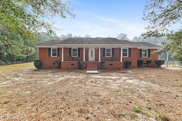 7.57 Acres of Land with Home for Sale in Riegelwood, North Carolina