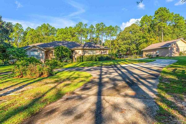 2.42 Acres of Land with Home for Sale in Pace, Florida