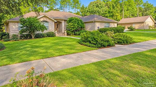 2.42 Acres of Land with Home for Sale in Pace, Florida