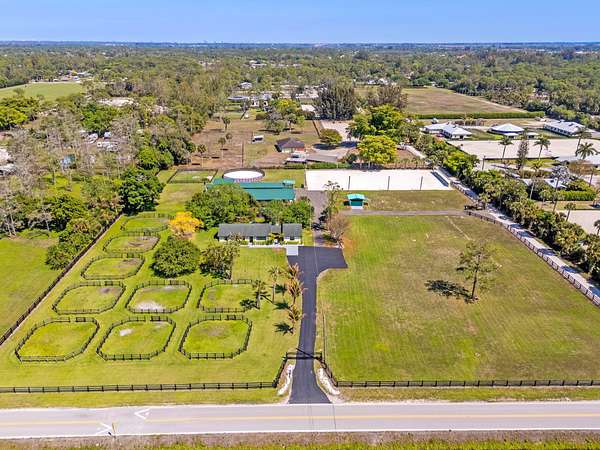 5 Acres of Land with Home for Sale in Loxahatchee Groves, Florida