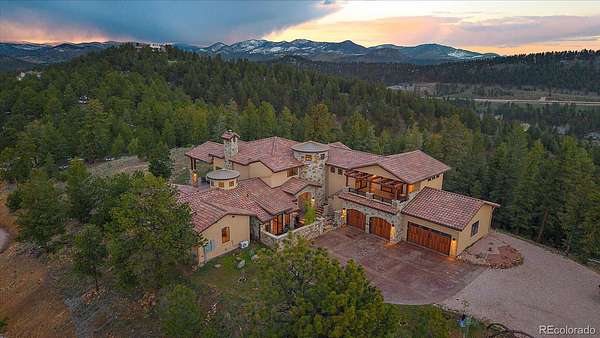 13.9 Acres of Land with Home for Sale in Evergreen, Colorado