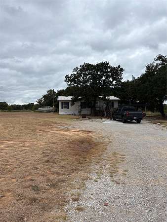 4.48 Acres of Land with Home for Sale in Bridgeport, Texas