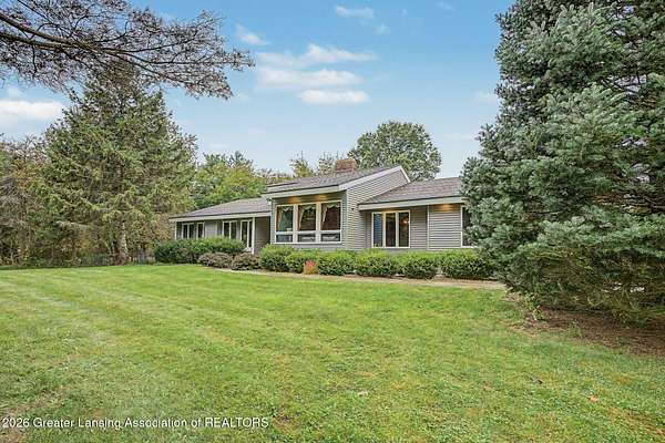 10.7 Acres of Recreational Land with Home for Sale in Williamston, Michigan