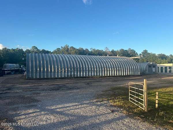 4.8 Acres of Improved Commercial Land for Sale in Kiln, Mississippi