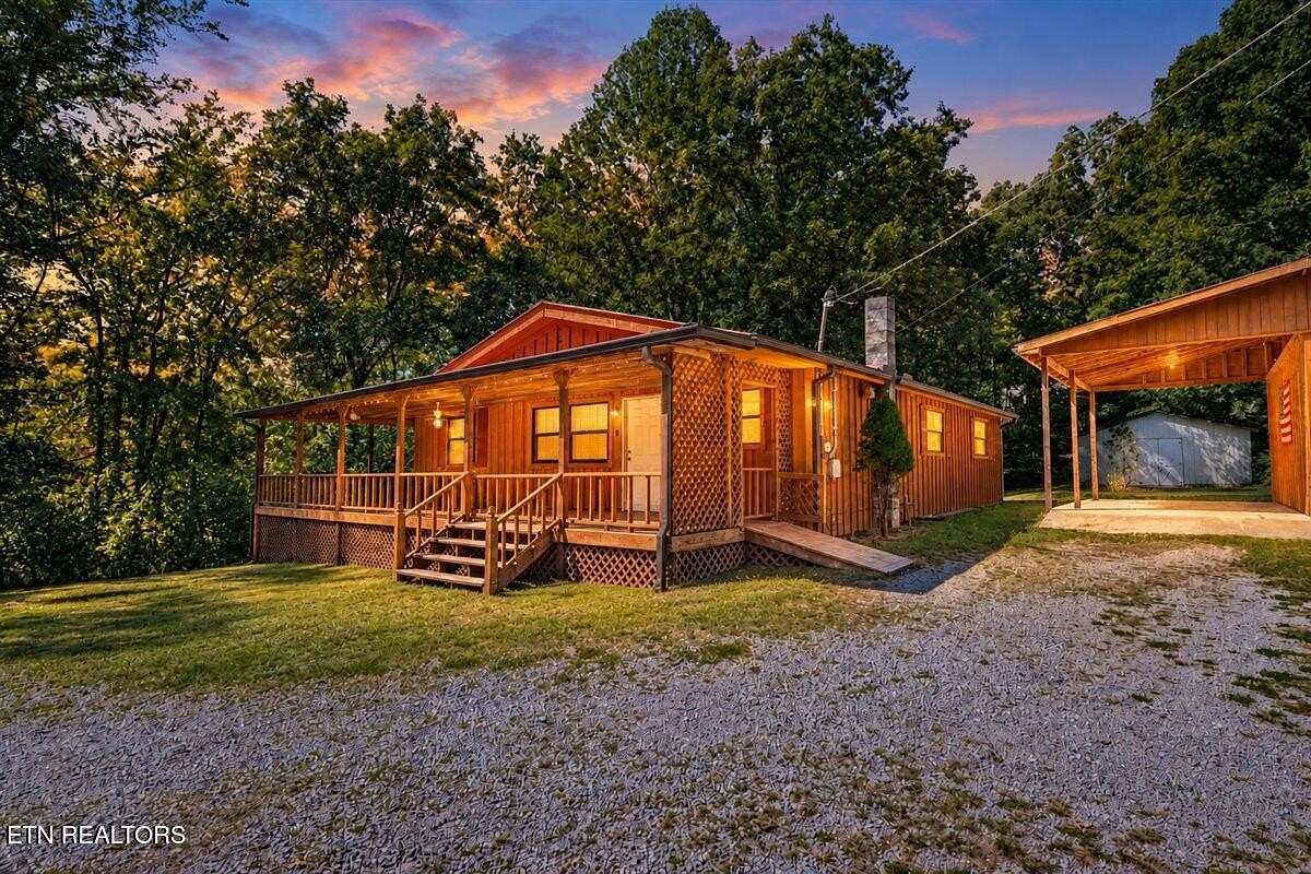 5.54 Acres of Land with Home for Sale in Robbins, Tennessee