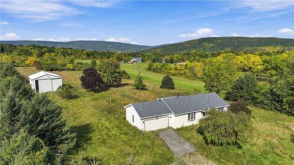 6.7 Acres of Land with Home for Sale in Middlesex, New York