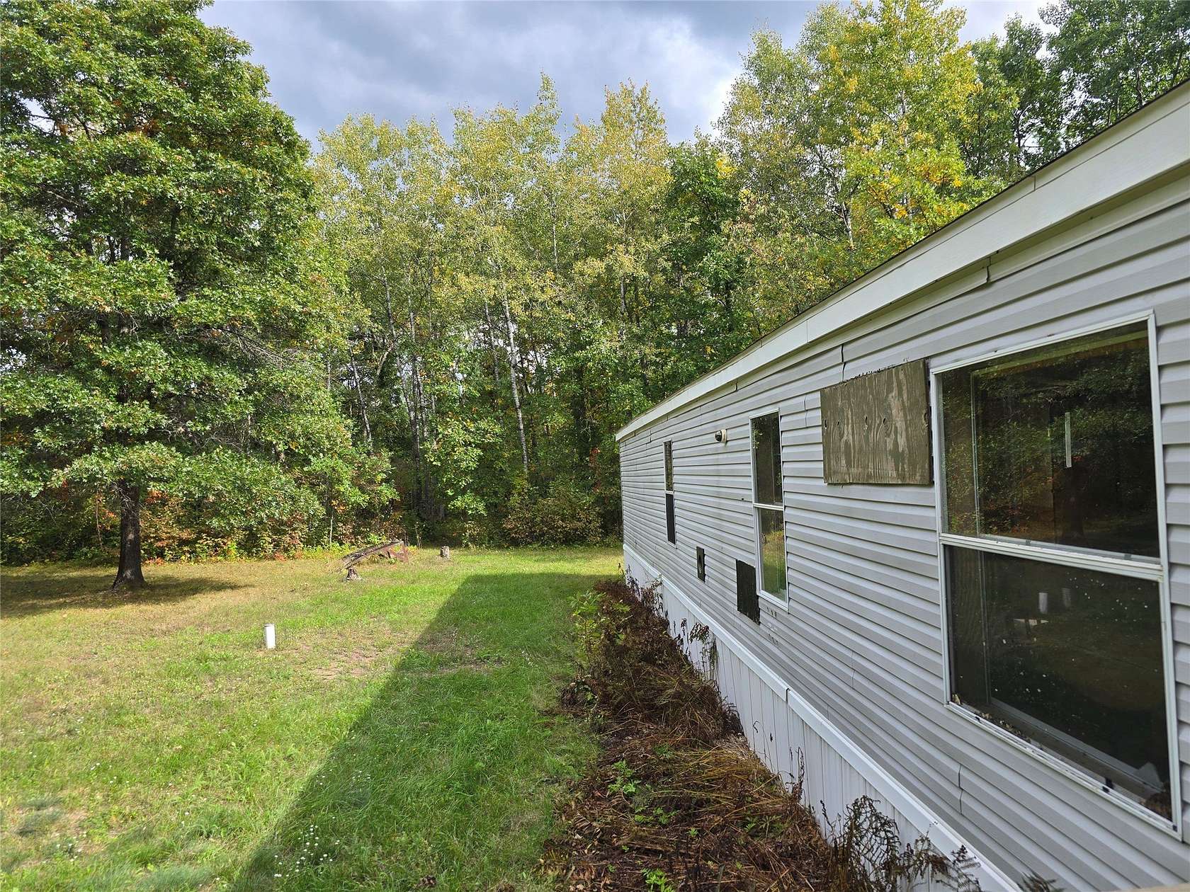 15 Acres of Recreational Land with Home for Sale in Trego, Wisconsin
