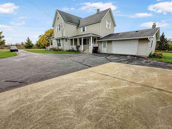40 Acres of Land with Home for Sale in Carney, Michigan