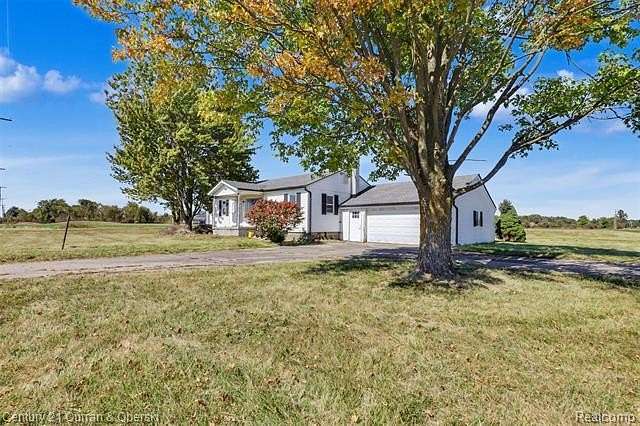 7 Acres of Land with Home for Sale in Casco Township, Michigan