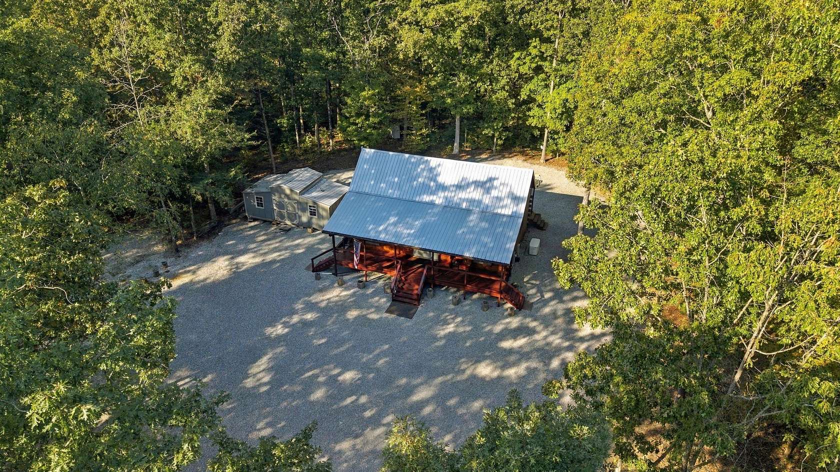 9.46 Acres of Land with Home for Sale in Hurricane Mills, Tennessee