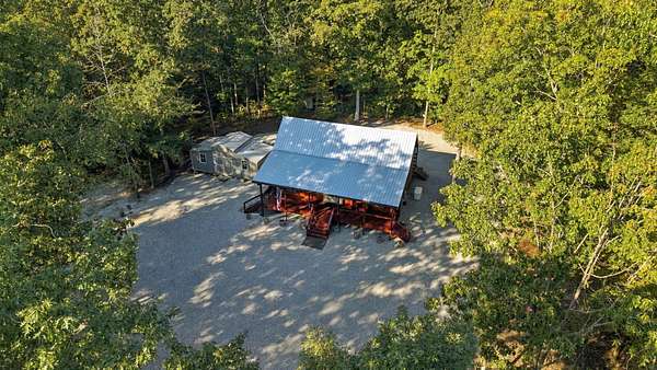 9.46 Acres of Land with Home for Sale in Hurricane Mills, Tennessee
