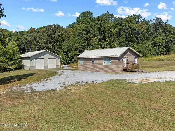 27.4 Acres of Agricultural Land with Home for Sale in Athens, Tennessee