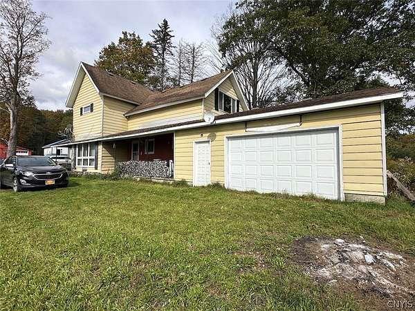 3.84 Acres of Land with Home for Sale in Freedom, New York
