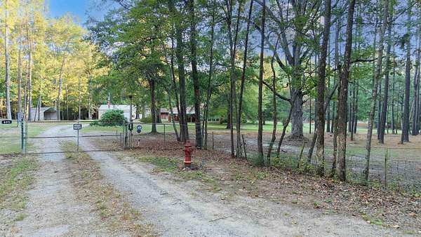 8.9 Acres of Land with Home for Sale in Pine Bluff, Arkansas