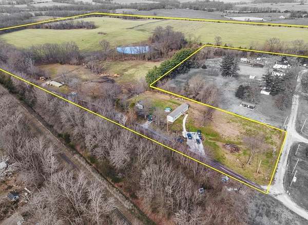 60.7 Acres of Land with Home for Sale in Clifton Hill, Missouri