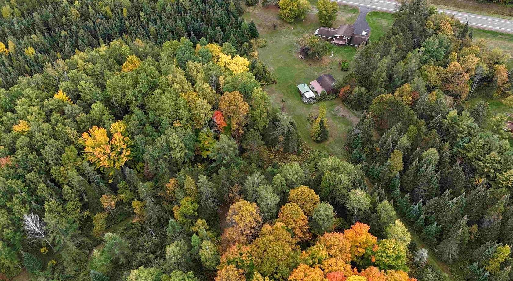 13.7 Acres of Recreational Land with Home for Sale in Butternut, Wisconsin