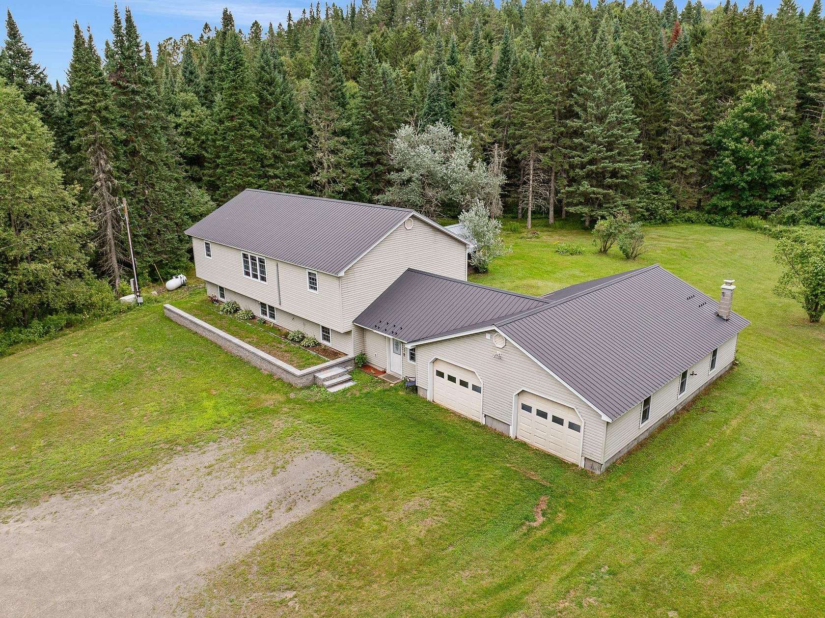 3.17 Acres of Land with Home for Sale in Pittsburg, New Hampshire