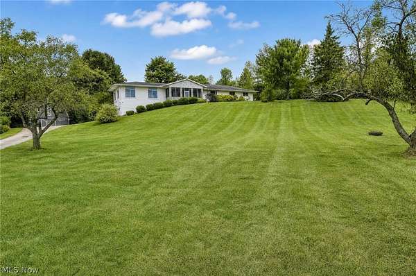 5 Acres of Land with Home for Sale in Chesterland, Ohio