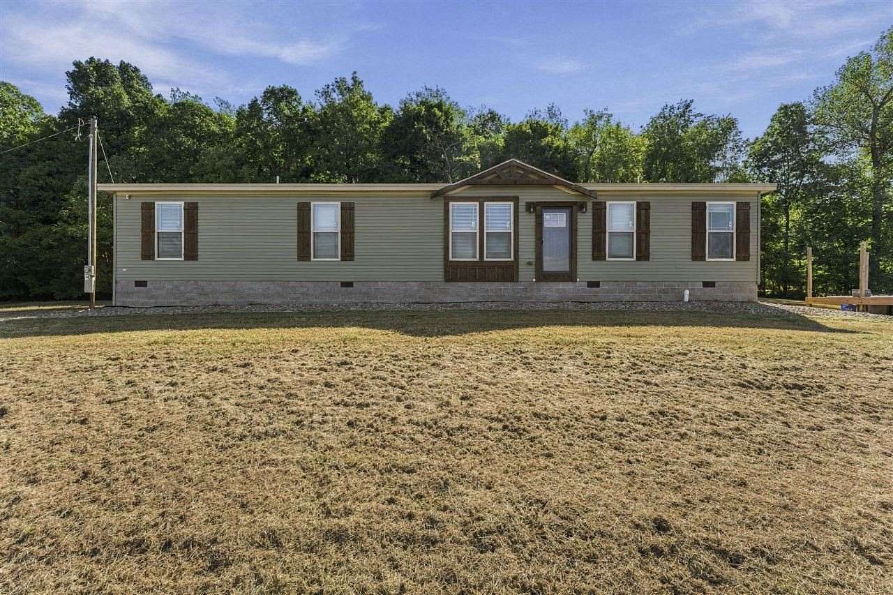 11.8 Acres of Land with Home for Sale in Austin, Kentucky