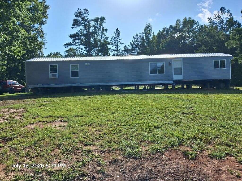 3 Acres of Land with Home for Sale in Falkner, Mississippi