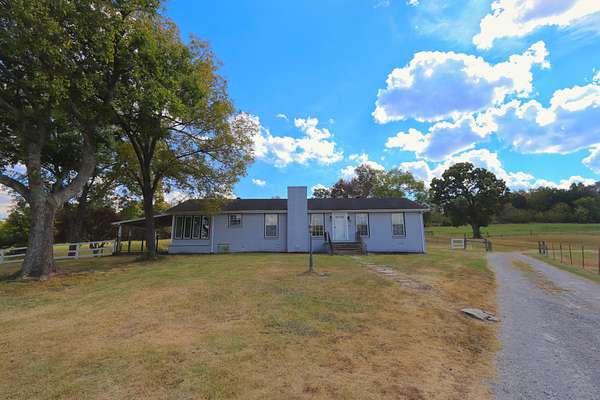 89.2 Acres of Agricultural Land with Home for Sale in Lebanon, Tennessee