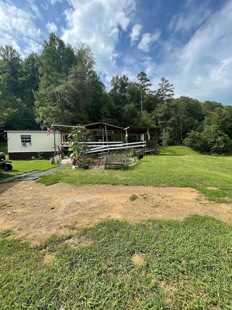 47.3 Acres of Land with Home for Sale in Alkol, West Virginia
