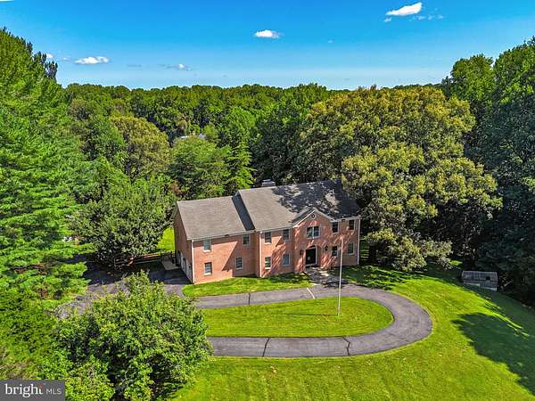 5 Acres of Land with Home for Sale in McLean, Virginia