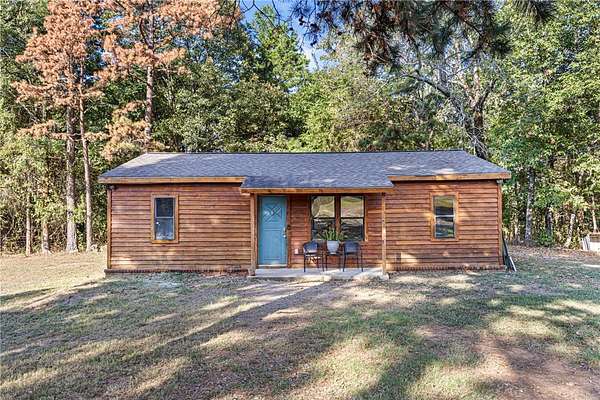 6.74 Acres of Land with Home for Sale in Clarksville, Arkansas