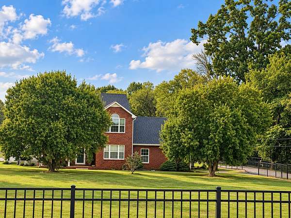 6.49 Acres of Land with Home for Sale in Christiana, Tennessee