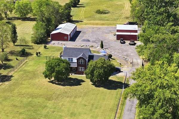 6.49 Acres of Land with Home for Sale in Christiana, Tennessee