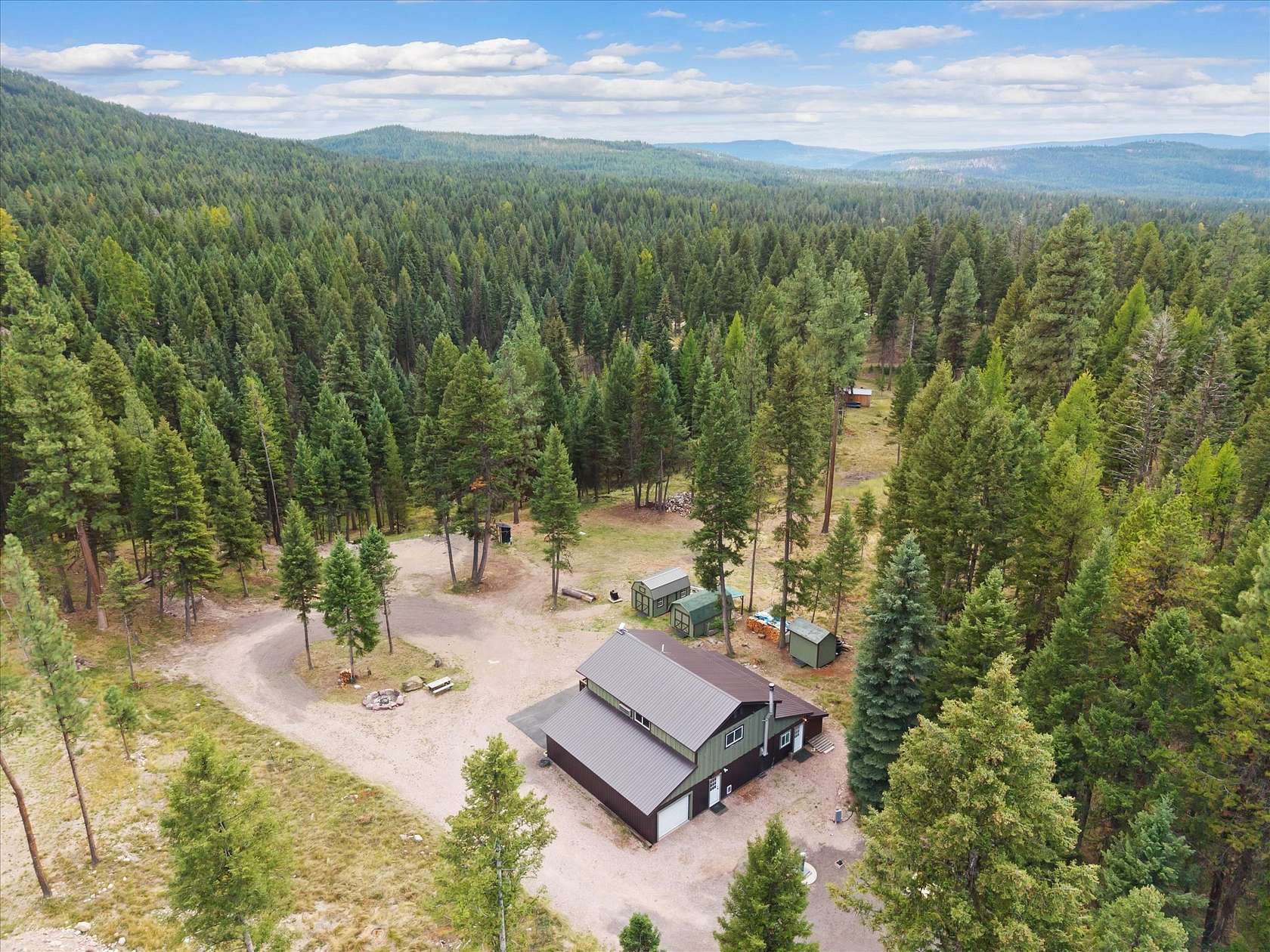 2.79 Acres of Land with Home for Sale in Seeley Lake, Montana