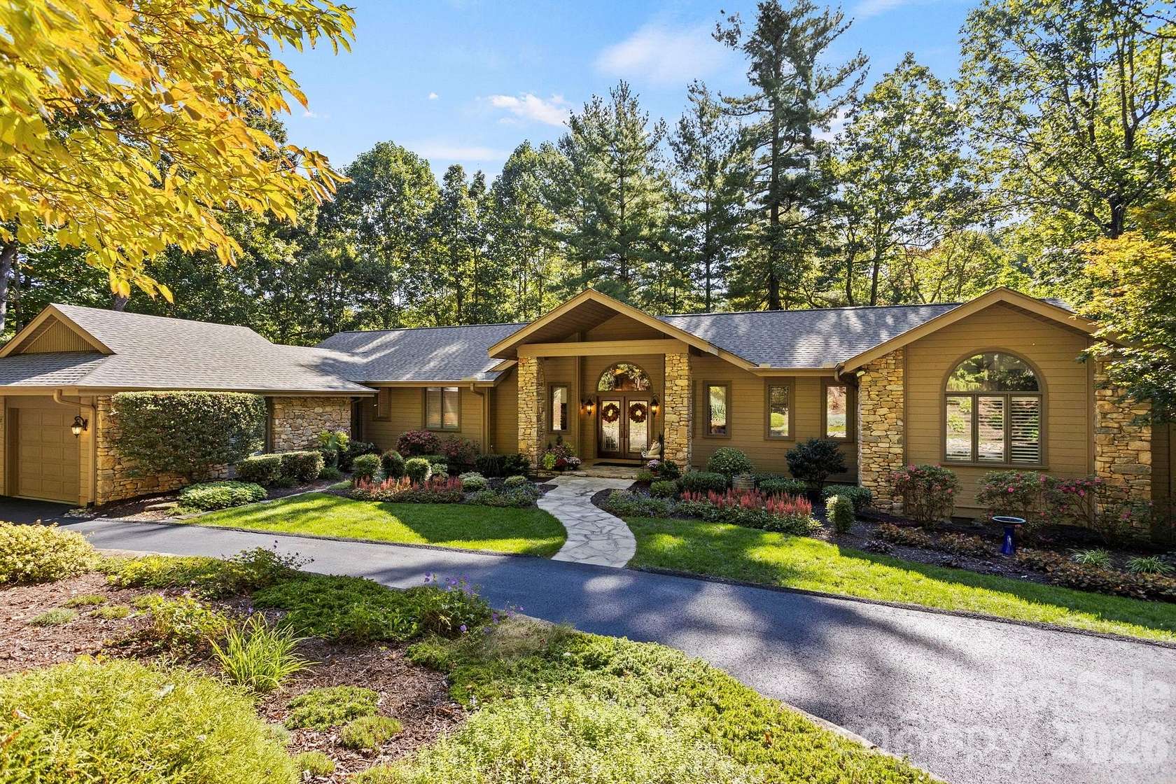 1.56 Acres of Land with Home for Sale in Flat Rock, North Carolina