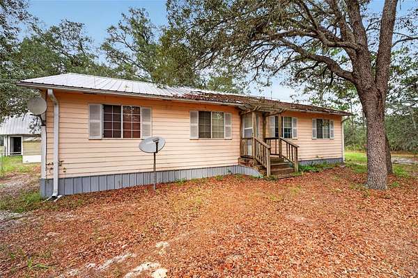 2.5 Acres of Land with Home for Sale in Bronson, Florida