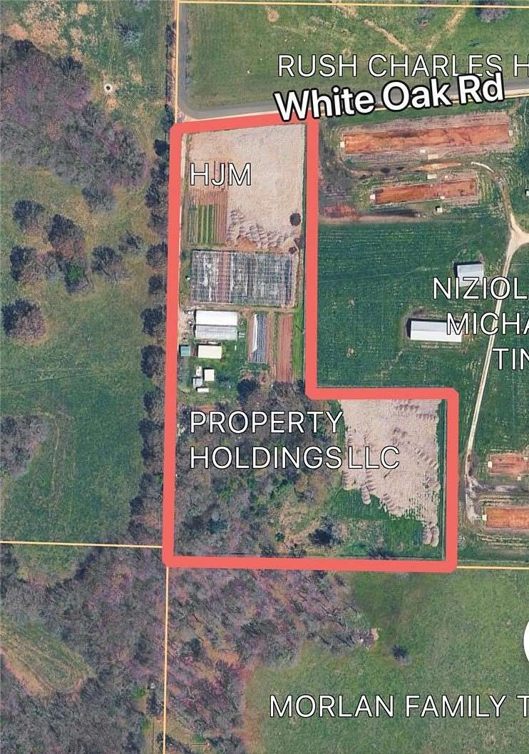 11.2 Acres of Land with Home for Sale in Fayetteville, Arkansas