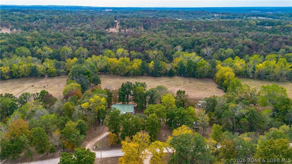 10 Acres of Land with Home for Sale in Brumley, Missouri