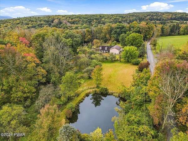 6.65 Acres of Land with Home for Sale in Beach Lake, Pennsylvania