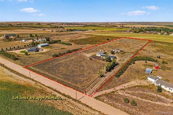 10 Acres of Land with Home for Sale in Fort Morgan, Colorado