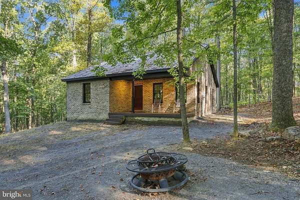 5 Acres of Land with Home for Sale in Great Cacapon, West Virginia