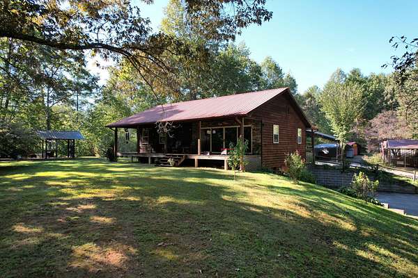 8.2 Acres of Land with Home for Sale in Reliance, Tennessee