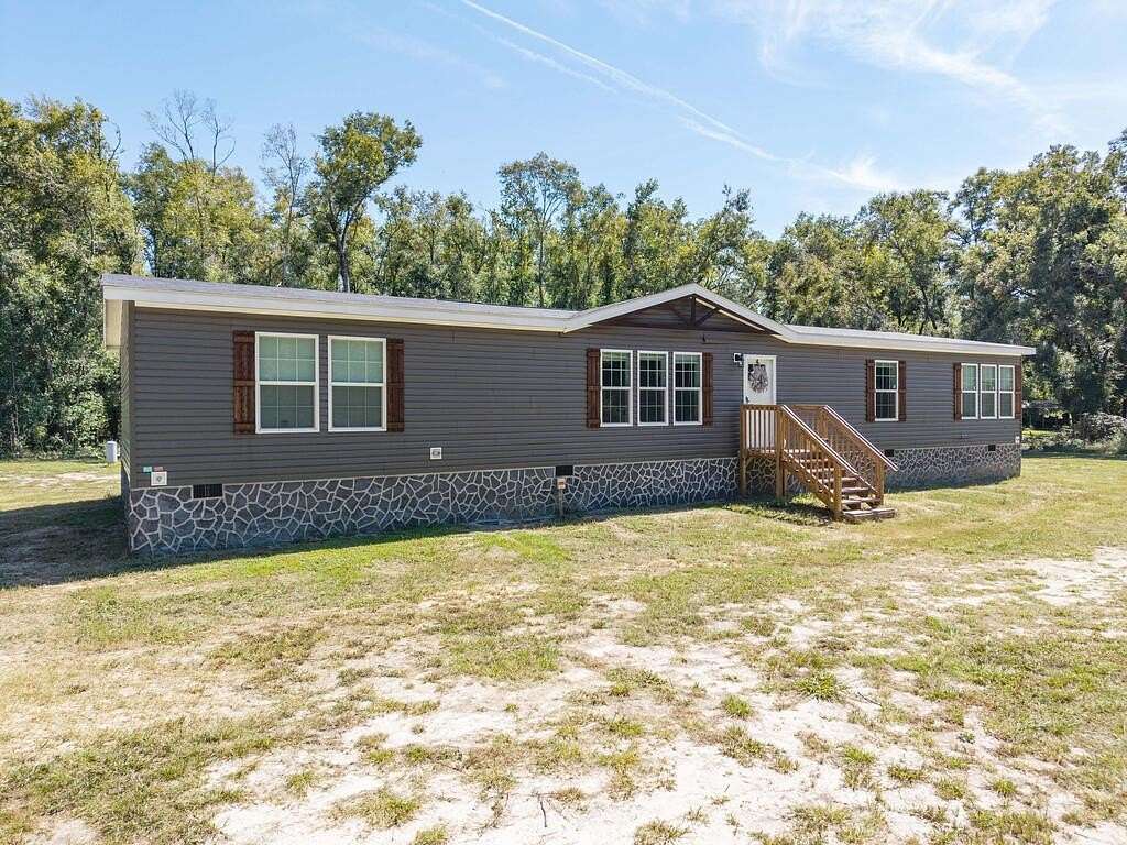 2 Acres of Land with Home for Sale in O'Brien, Florida