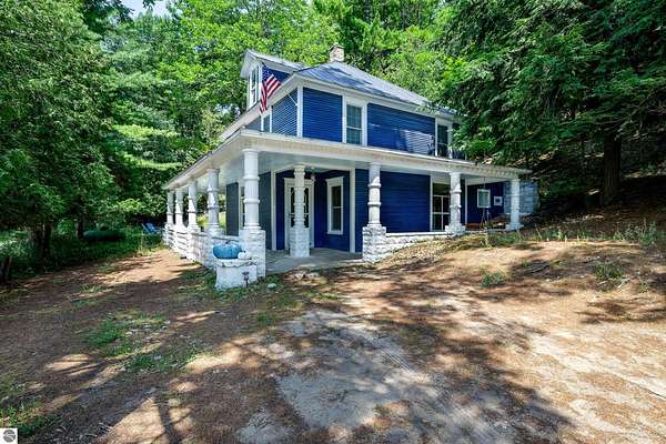 1.56 Acres of Land with Home for Sale in Honor, Michigan